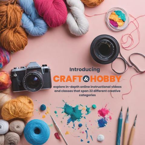 pink background with a variety of craft items such as yarn in brown, blue, pink, and white, a camera, string, paint splatters in blue, teal, and pink, and a set of paintbrushes